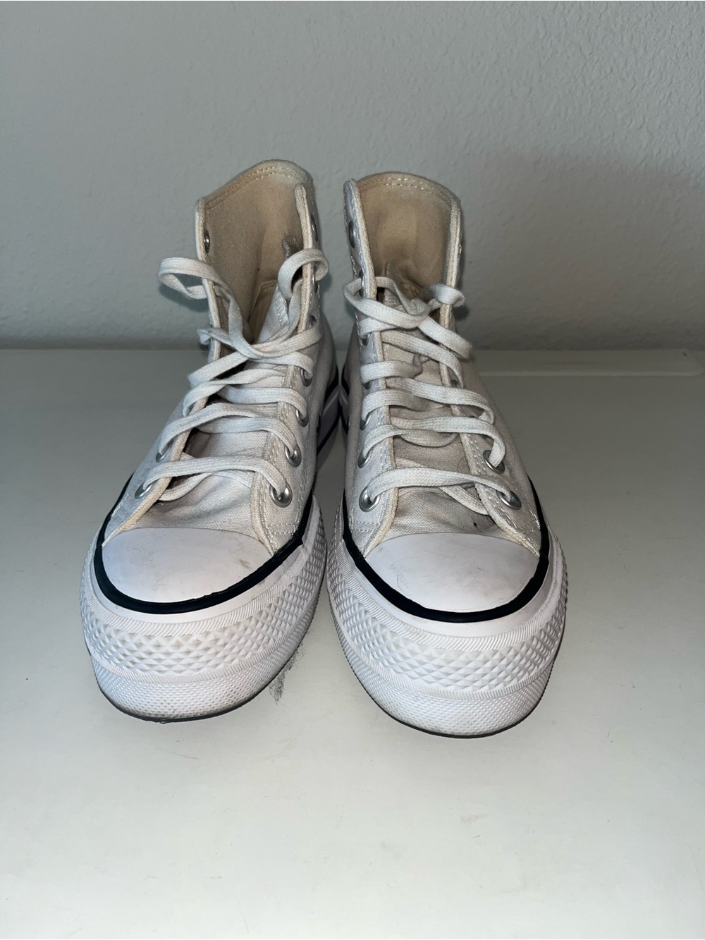 Converse White High-Top Platform Sneakers with Black Trim